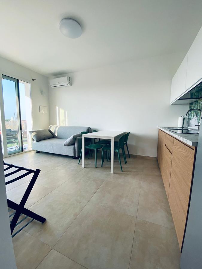 Soggiorno con cucina a vista